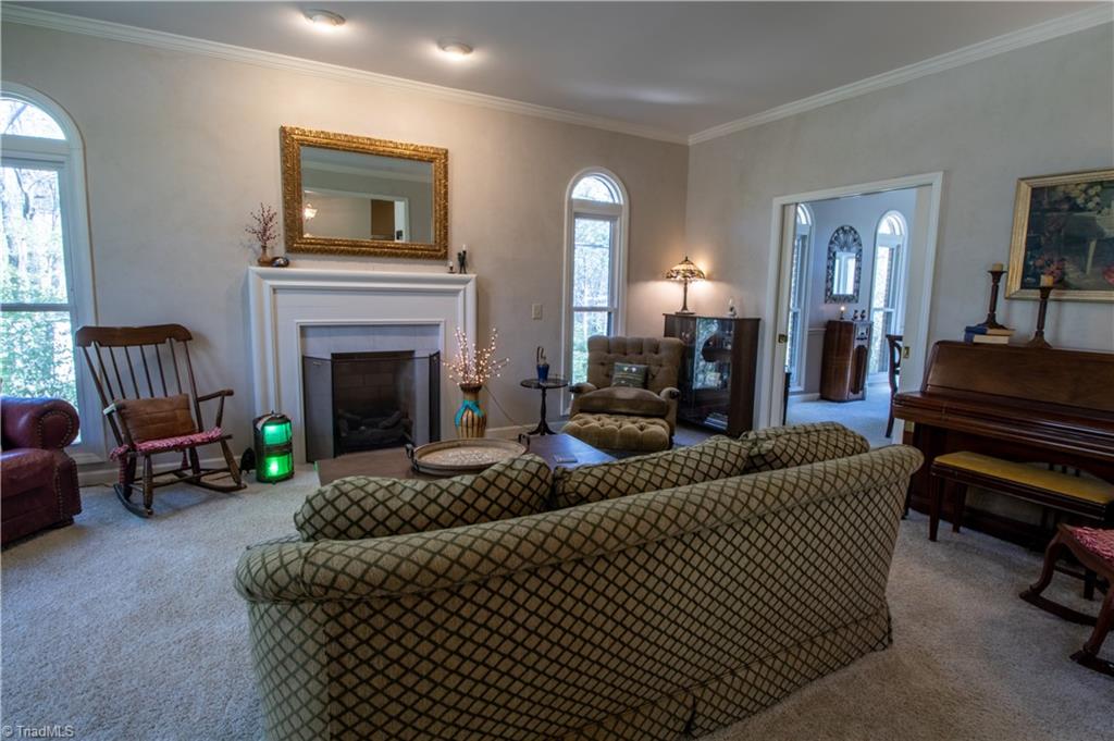 3612 Hunting Ridge Drive High Point, NC 27265 - Photo 3 of 24 Spacious living room with new gas logs.