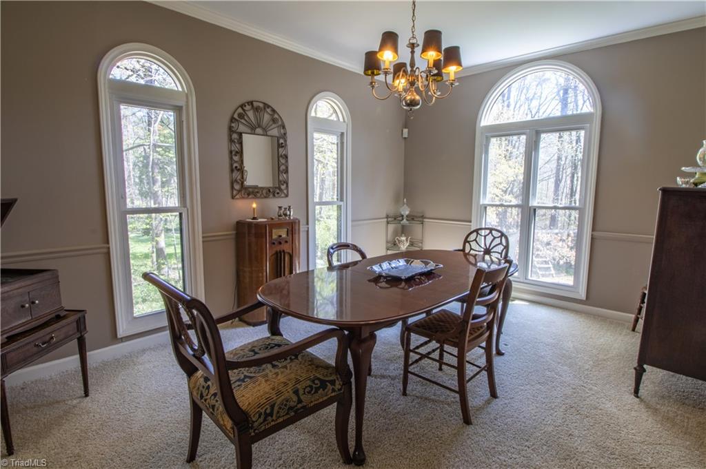 3612 Hunting Ridge Drive High Point, NC 27265 - Photo 5 of 24 Floor to ceiling windows really let in the light.