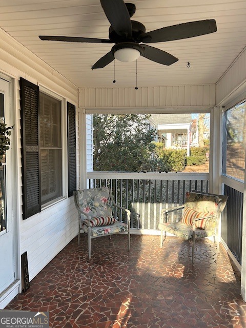 228 R Street Northwest Thomaston, GA 30286 - Photo 2 of 10 a balcony with furniture and a potted plant