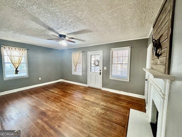 228 R Street Northwest Thomaston, GA 30286 - Photo 5 of 10 a view of an empty room with a fireplace and a window