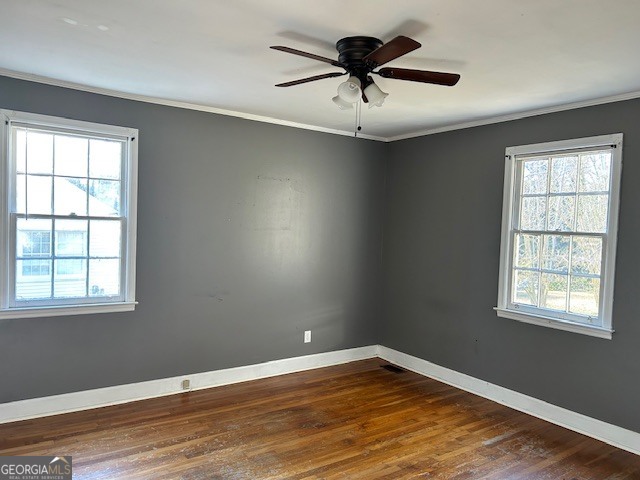 228 R Street Northwest Thomaston, GA 30286 - Photo 6 of 10 a view of an empty room with wooden floor and a window