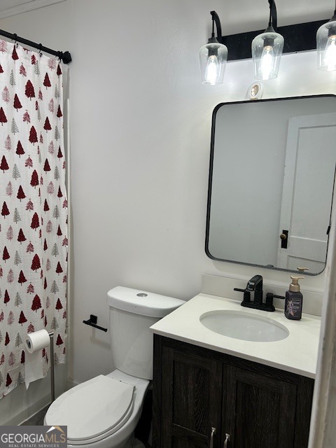 228 R Street Northwest Thomaston, GA 30286 - Photo 7 of 10 a bathroom with a sink a toilet and a mirror
