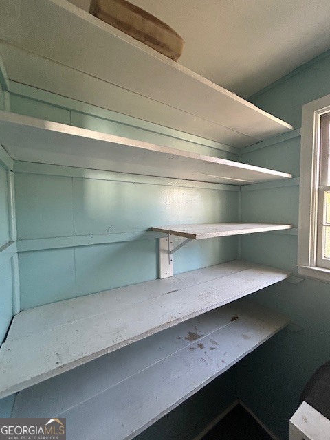 228 R Street Northwest Thomaston, GA 30286 - Photo 9 of 10 a locker room with a desk