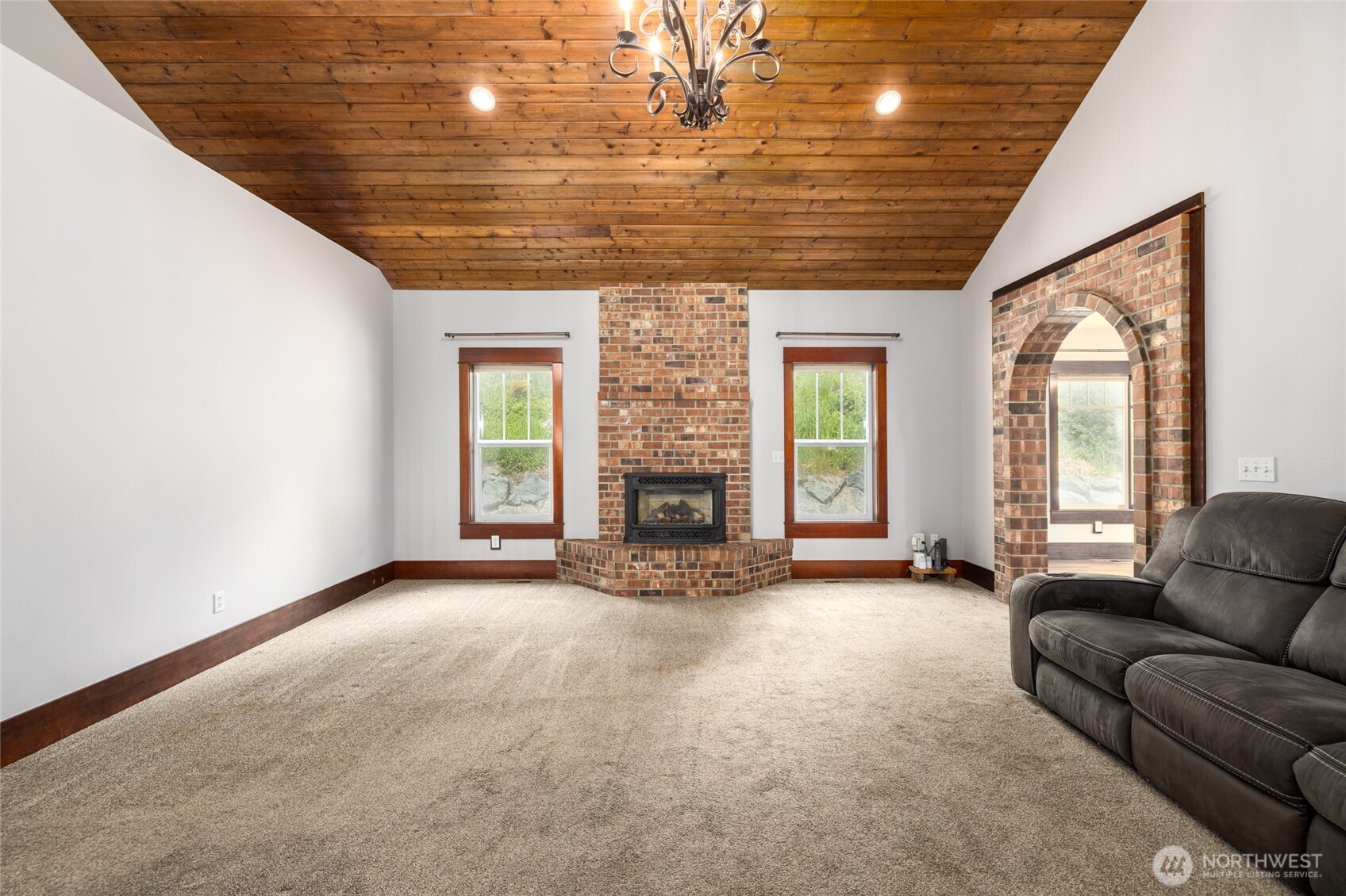 16711 Blodgett Road Mount Vernon, WA 98274 - Photo 8 of 36 a view of a livingroom with a fireplace and window