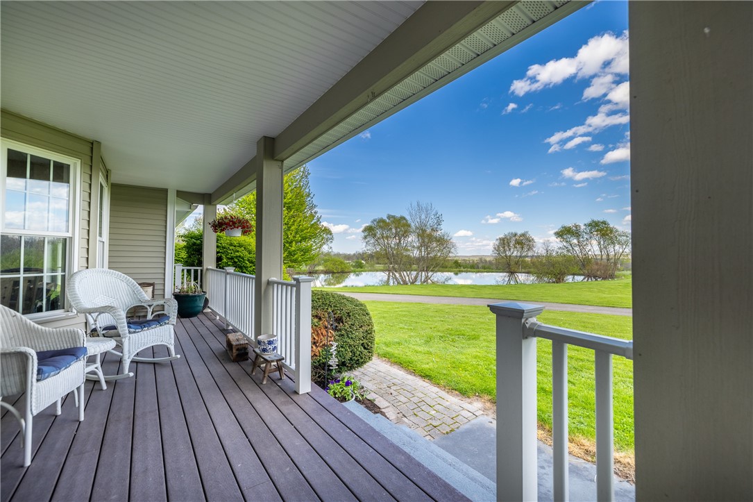 4128 River Road York, NY 14533 - Photo 14 of 50 COVERED FRONT & WRAP AROUND PORCH WITH POND VIEWS
