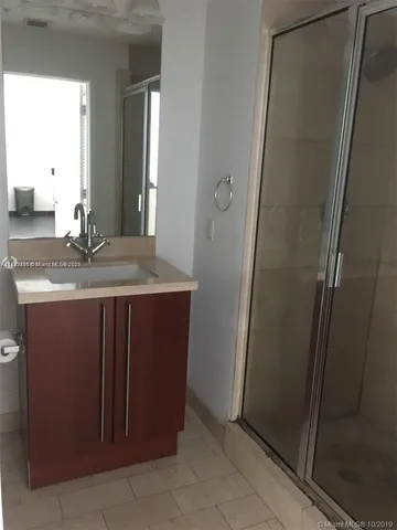 a bathroom with a toilet and a bathtub