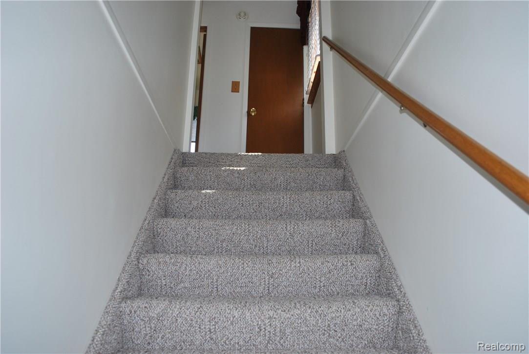 5365 Hollenbeck Road Columbiaville, MI 48421 - Photo 37 of 48 Stairs to 2nd level - Copy.JPG