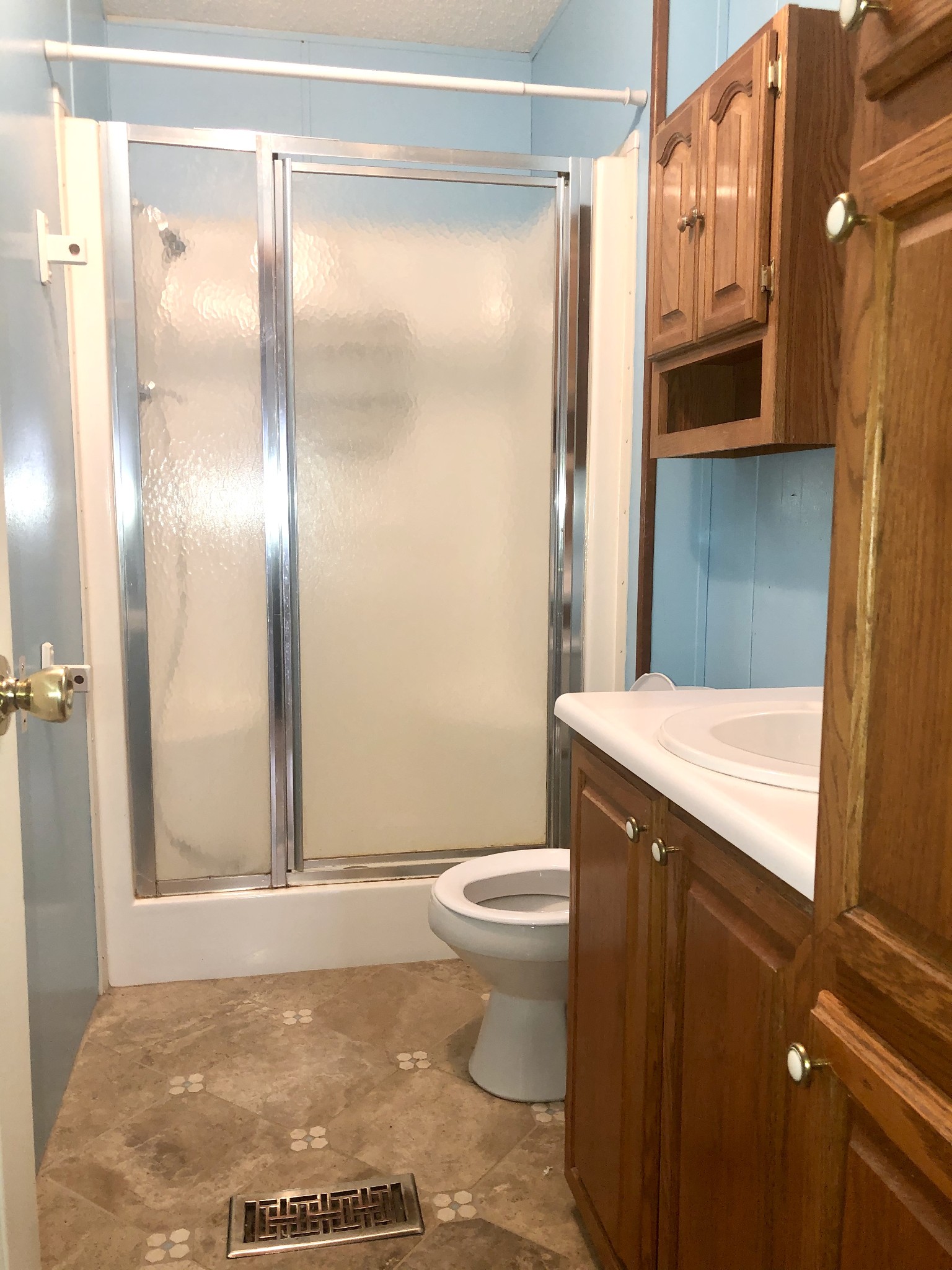 218 Watson Road Bumpus Mills, TN 37028 - Photo 17 of 23 a bathroom with a granite countertop sink toilet and shower
