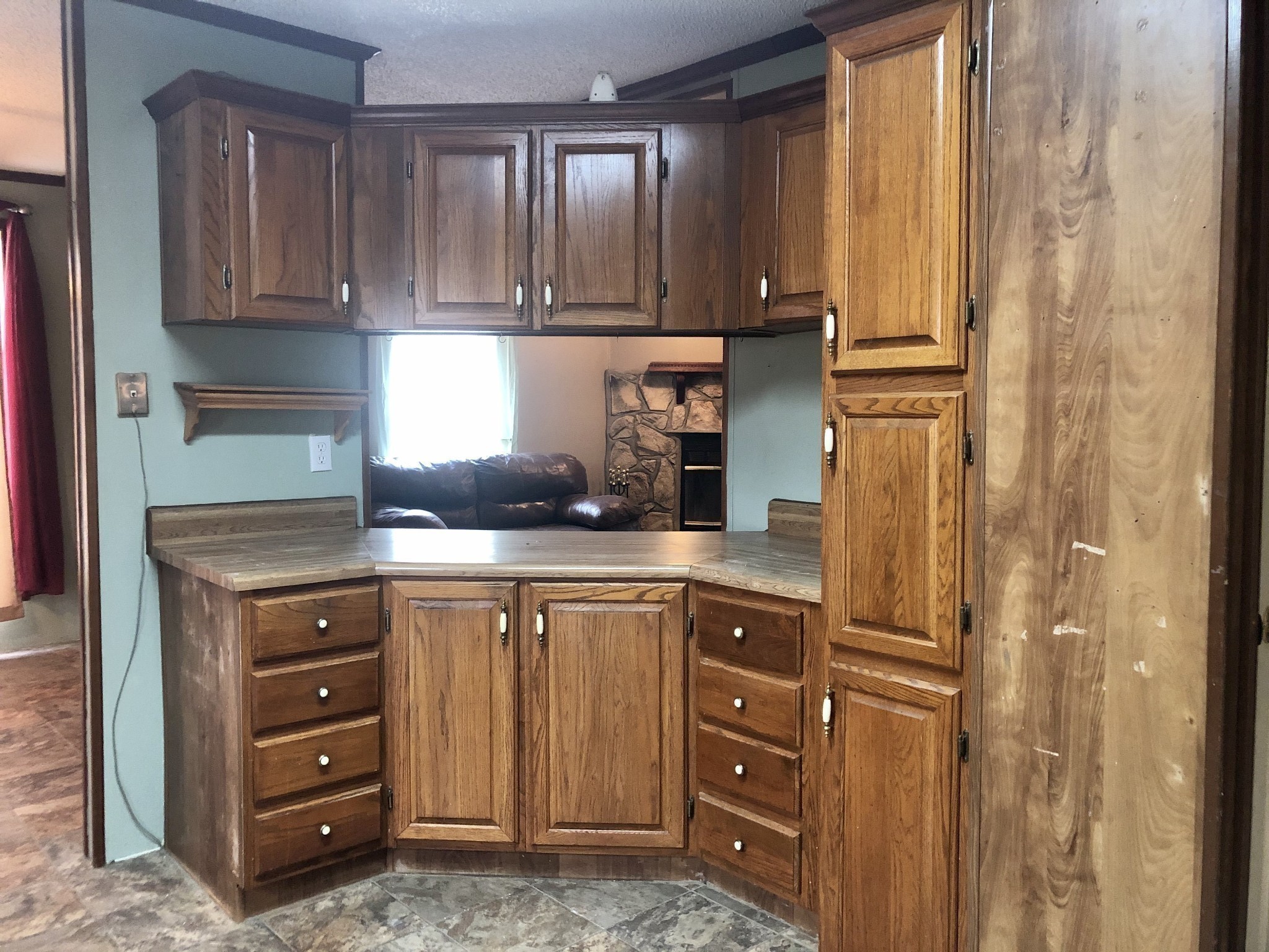 218 Watson Road Bumpus Mills, TN 37028 - Photo 9 of 23 a kitchen with appliances cabinets and a window