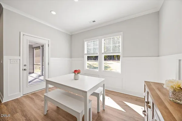 a large kitchen with stainless steel appliances lots of counter top space