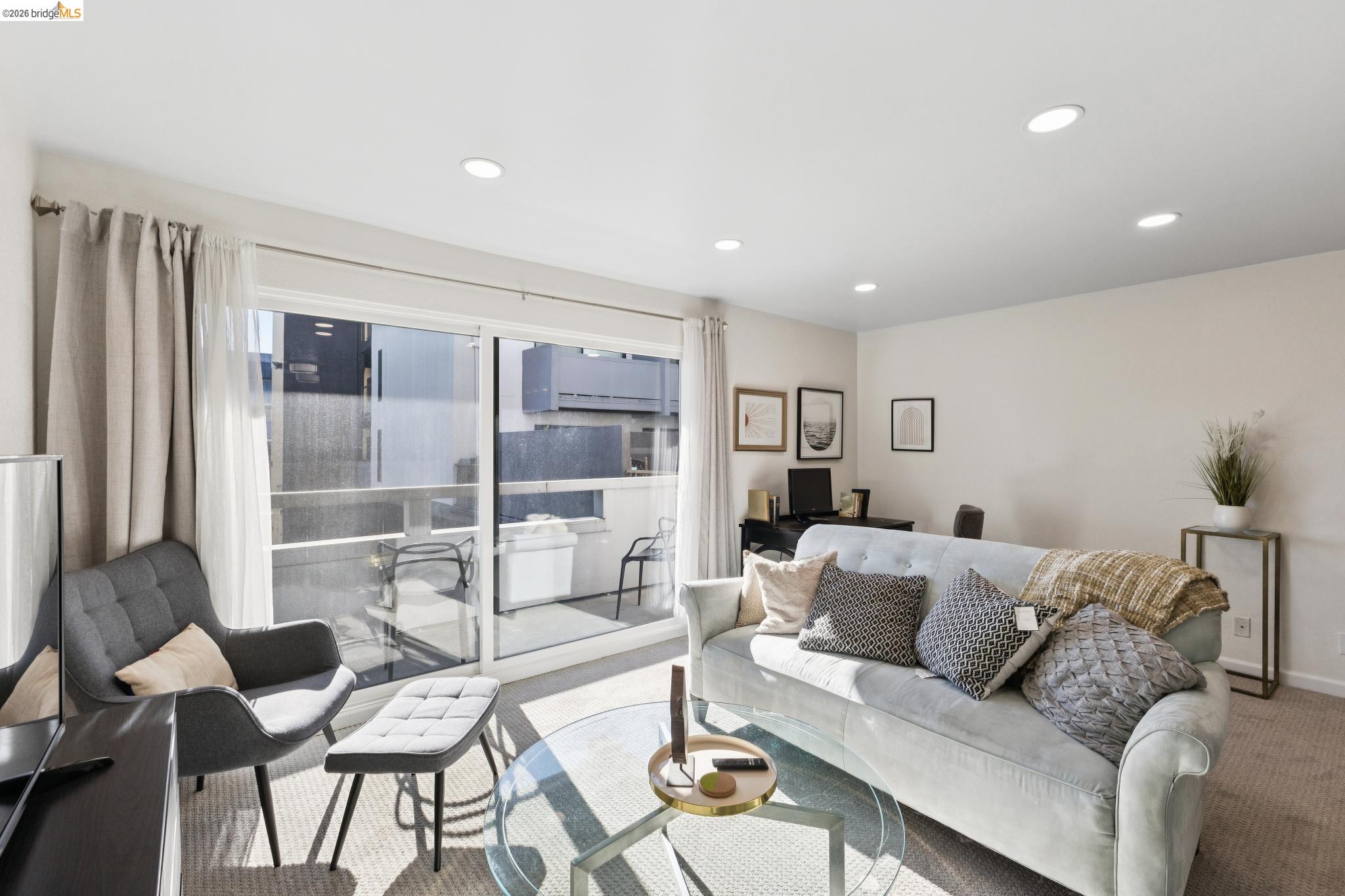 5 Embarcadero, Unit 129 Oakland, CA 94607 - Photo 12 of 32 Living area featuring carpet floors and recessed lighting