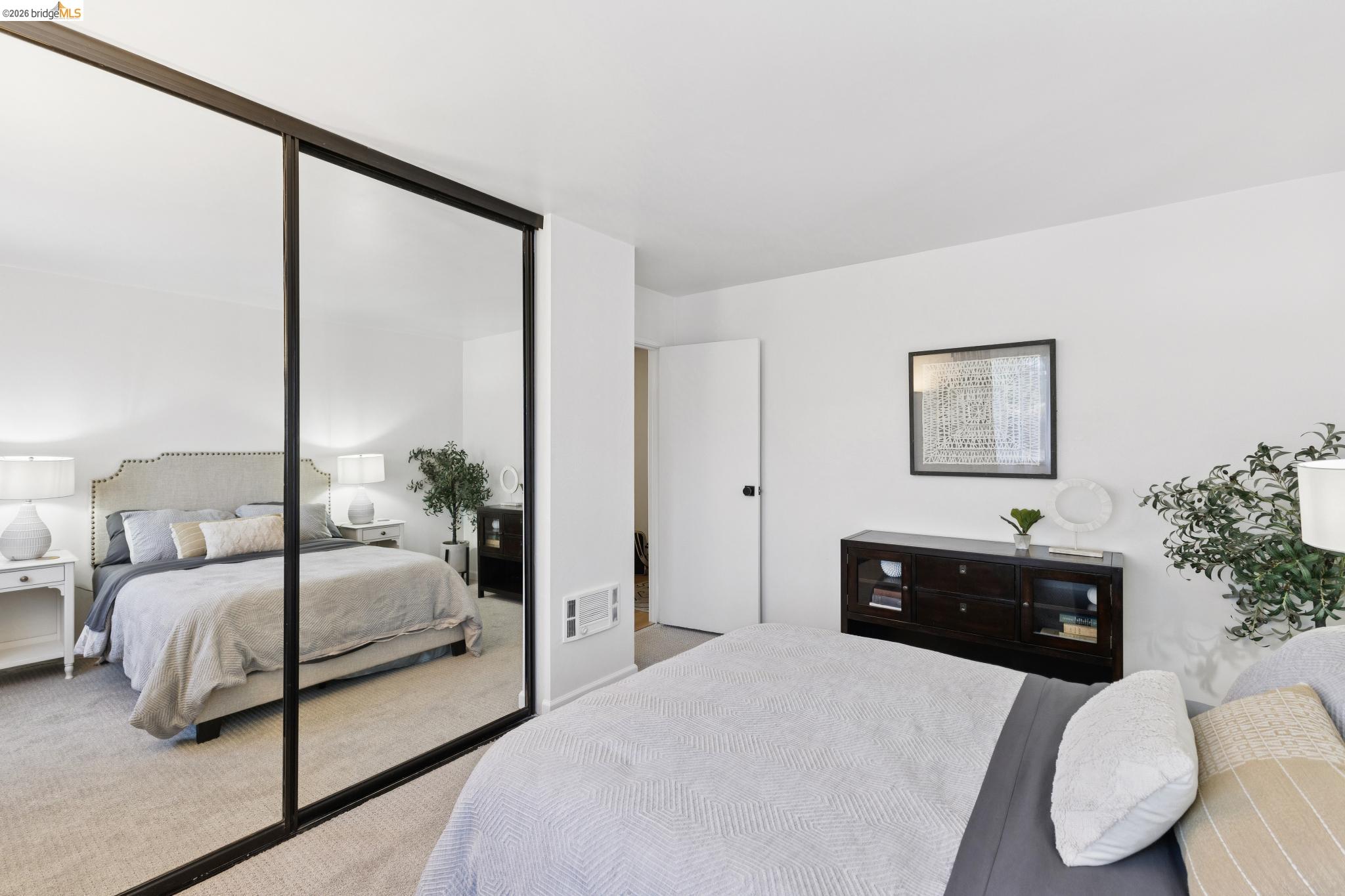 5 Embarcadero, Unit 129 Oakland, CA 94607 - Photo 17 of 32 Carpeted bedroom with a closet