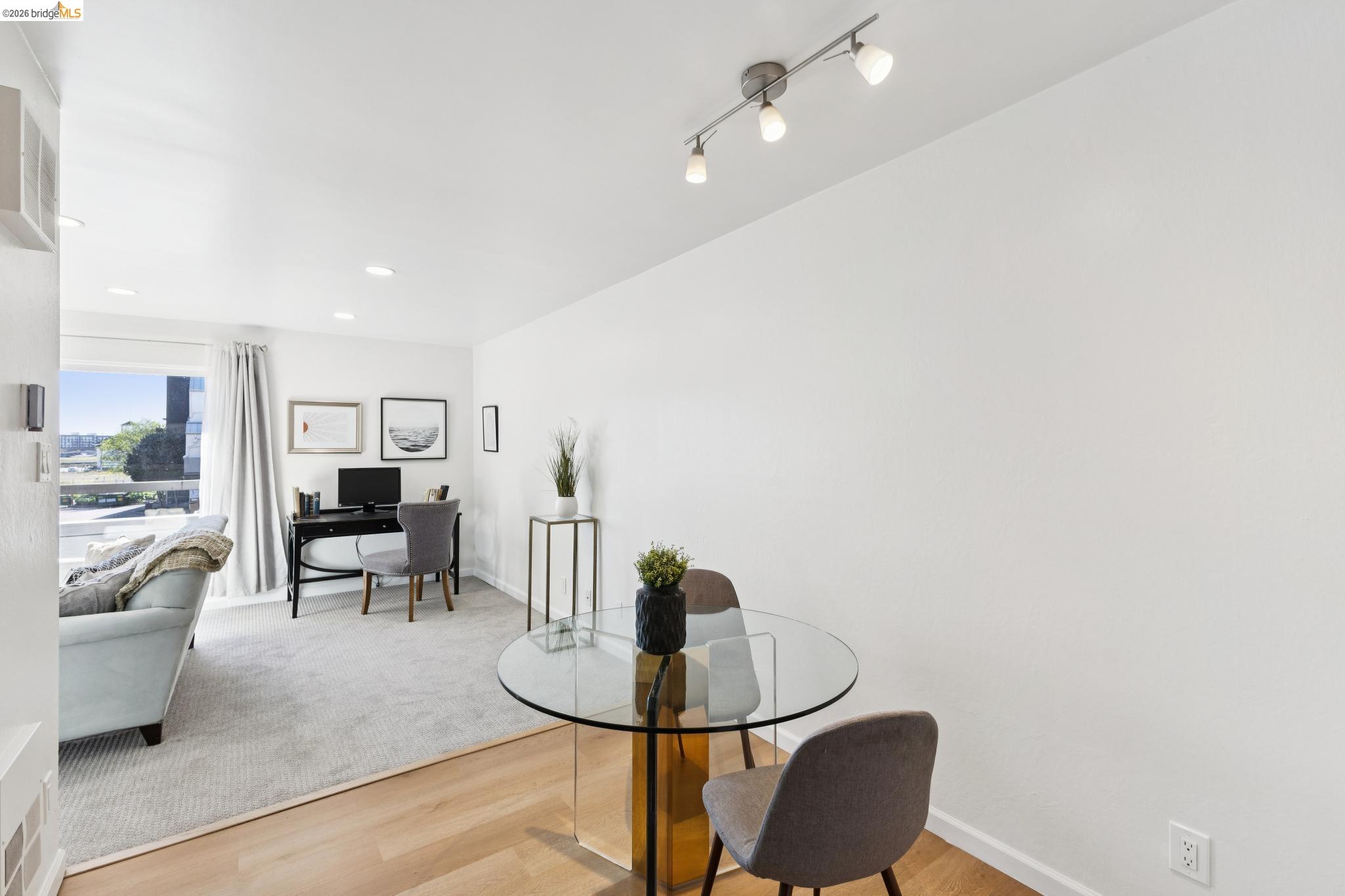 5 Embarcadero, Unit 129 Oakland, CA 94607 - Photo 6 of 32 Dining room with light wood-type flooring, a desk, and recessed lighting