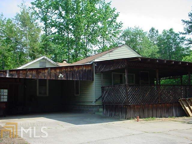 3426 Post Road Winston, GA 30187 - Photo 1 of 1 a front view of a house with a wooden fence
