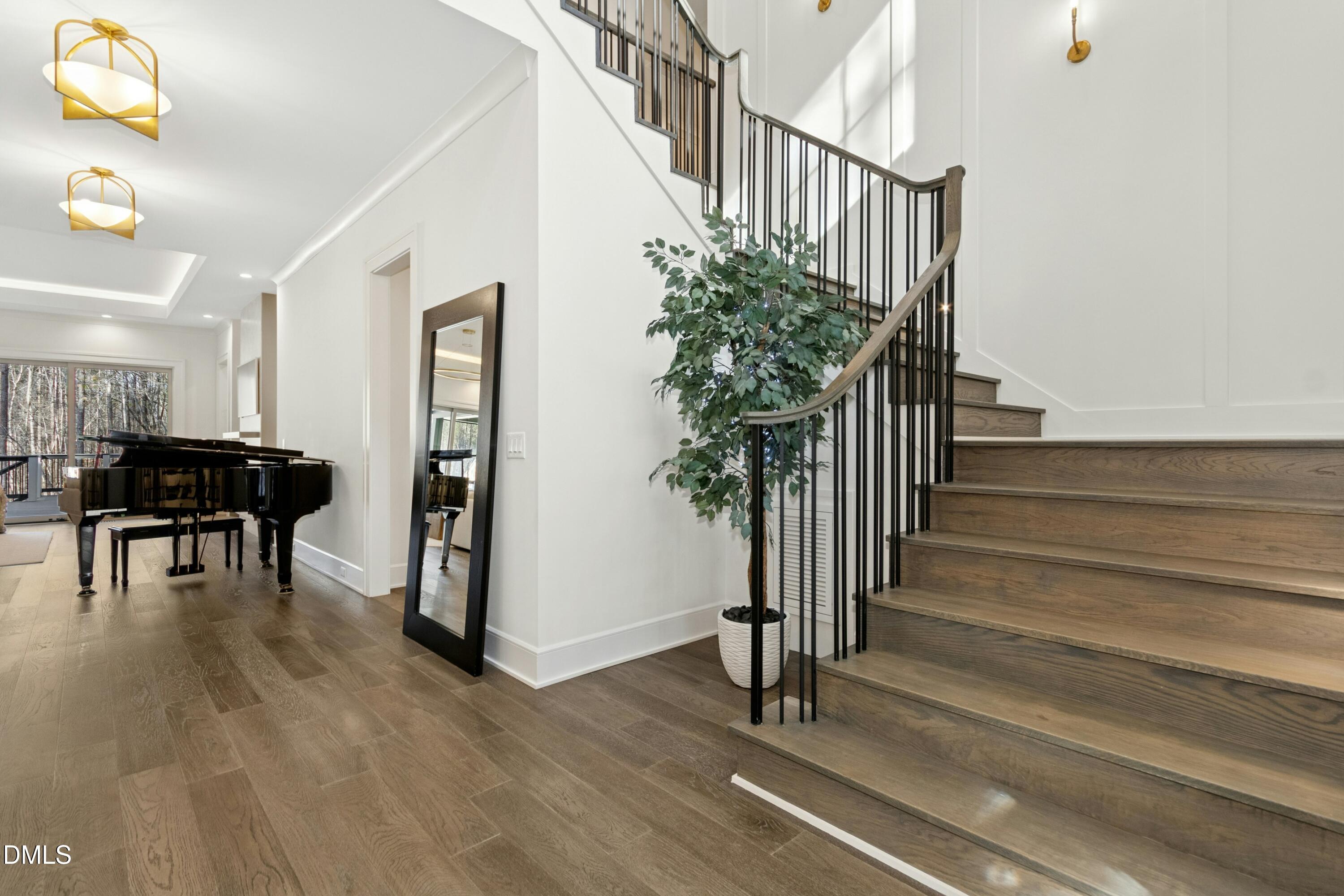 2200 Paddstowe Main Way Wake Forest, NC 27587 - Photo 5 of 55 a view of entryway and hall with wooden floor