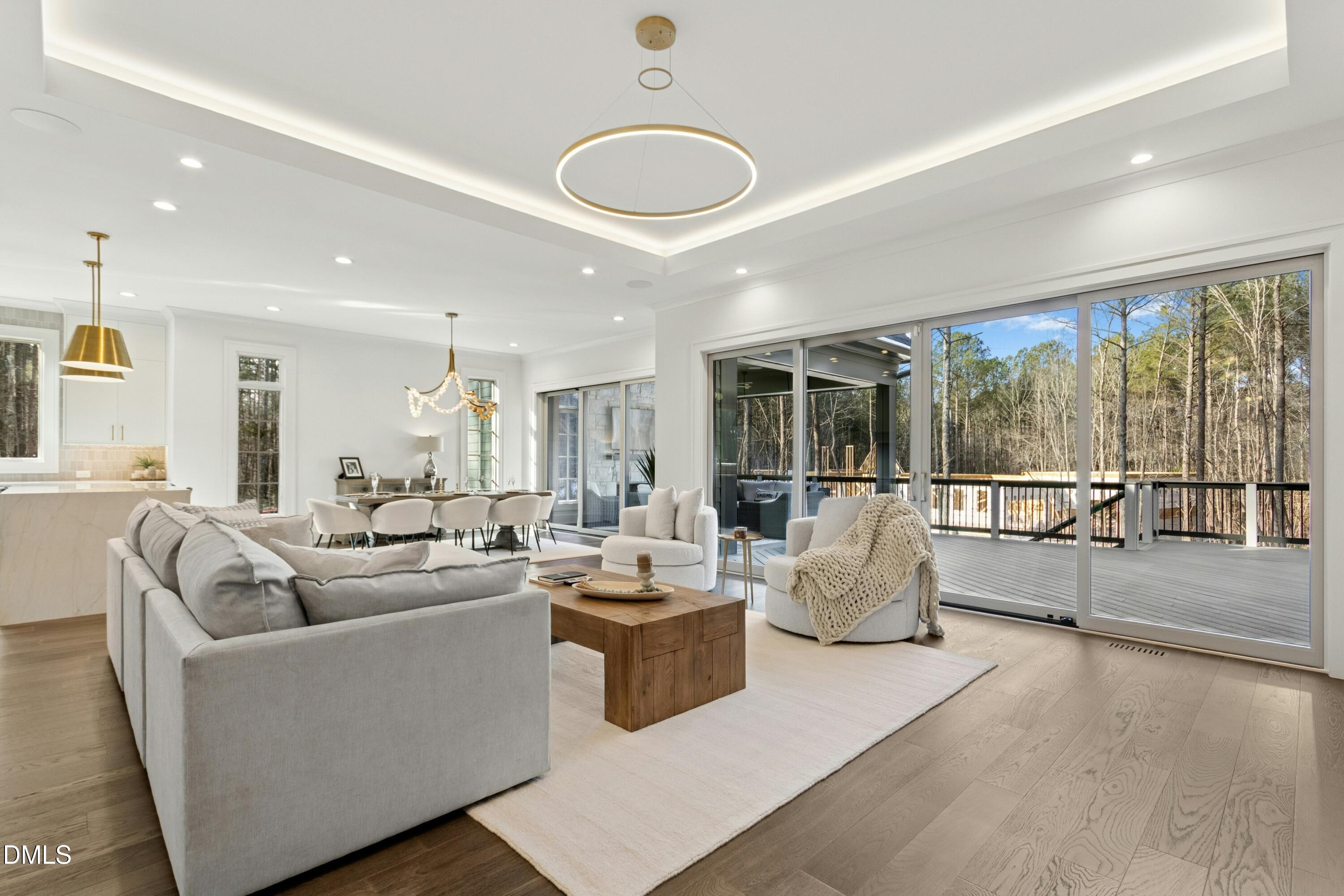 2200 Paddstowe Main Way Wake Forest, NC 27587 - Photo 8 of 55 a living room with furniture and a large window