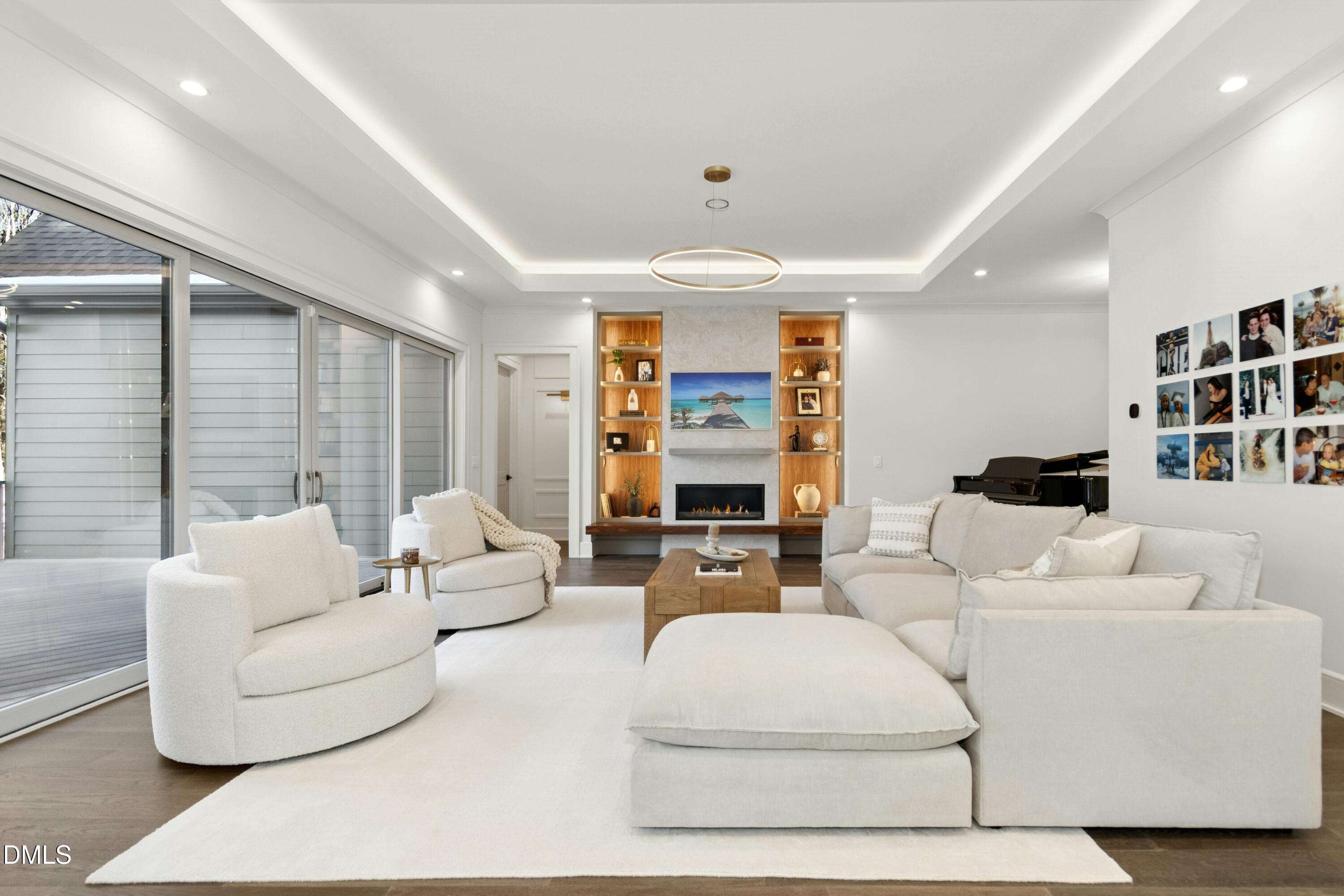 2200 Paddstowe Main Way Wake Forest, NC 27587 - Photo 10 of 55 a living room with furniture and a large window