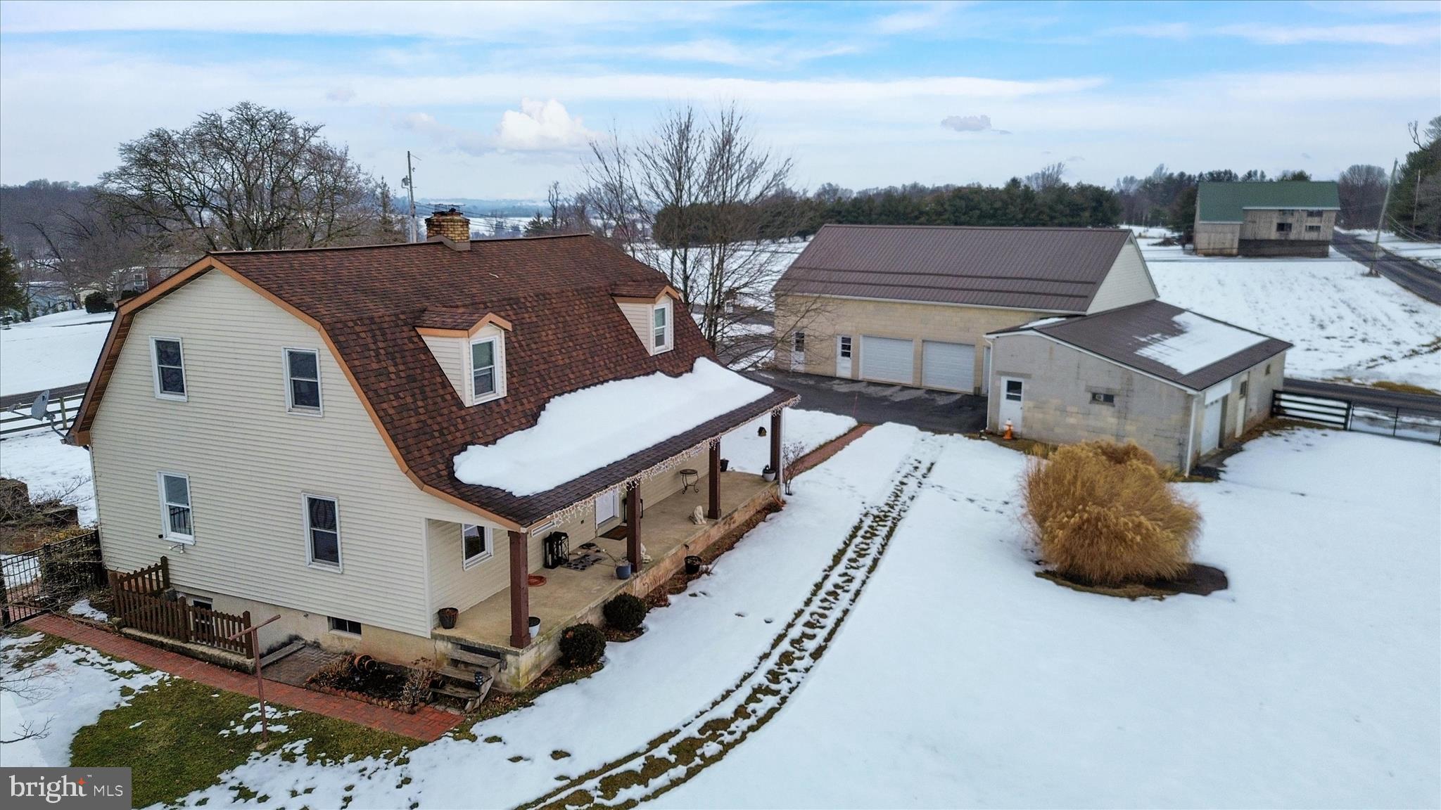 303 Gates Road Hershey, PA 17033 - Photo 11 of 53 a view of a house with backyard and sitting area