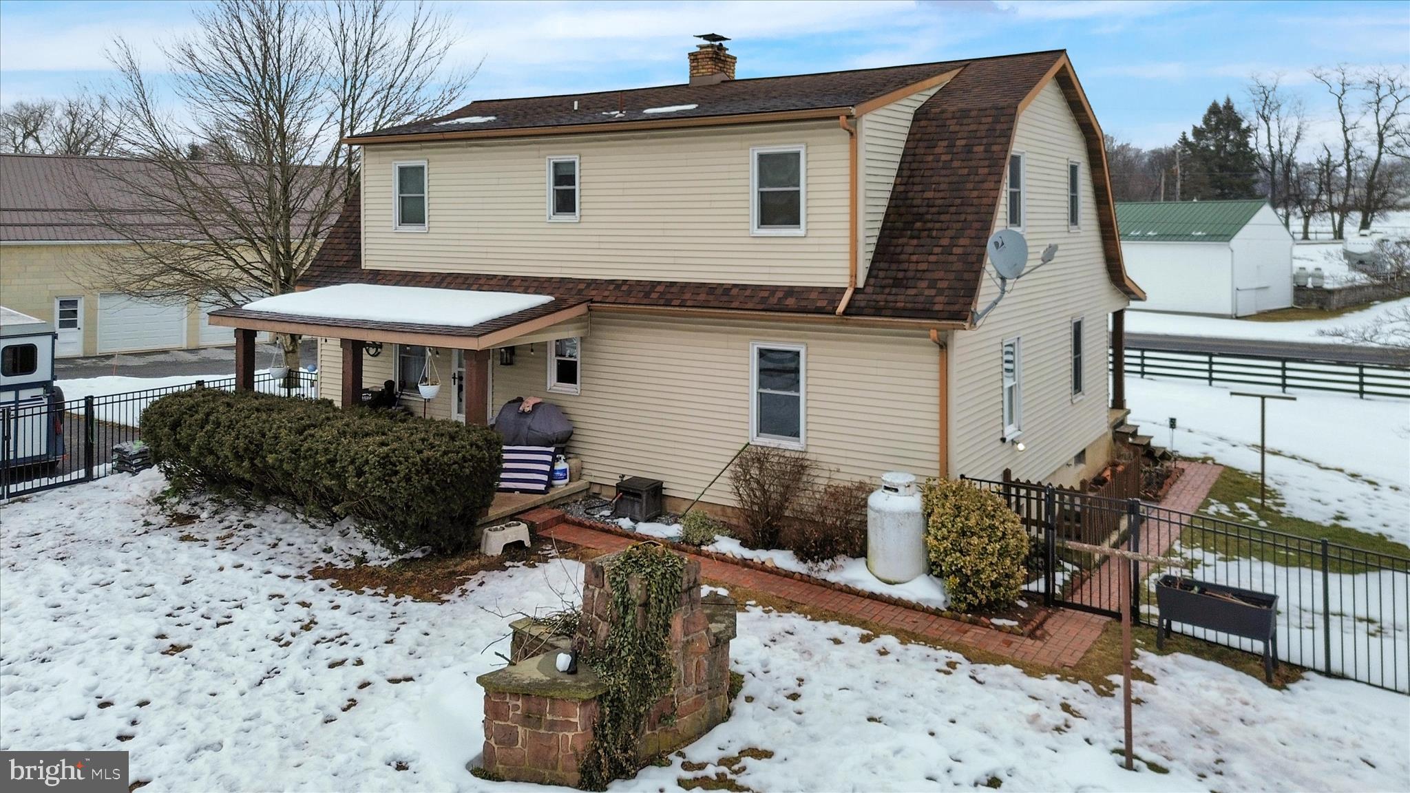 303 Gates Road Hershey, PA 17033 - Photo 14 of 53 a view of a chairs and table in backyard