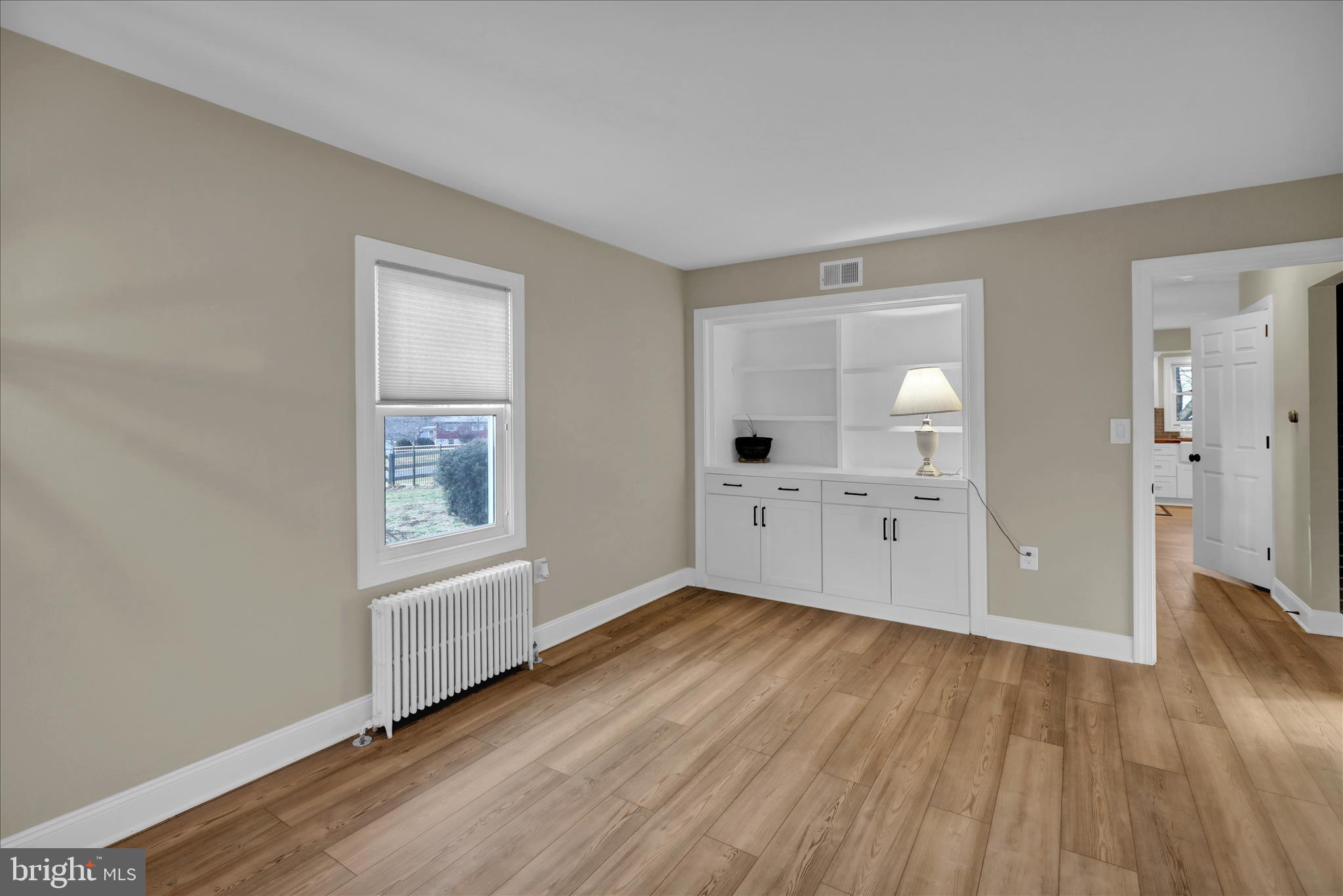 303 Gates Road Hershey, PA 17033 - Photo 22 of 53 an empty room with windows and wooden floor