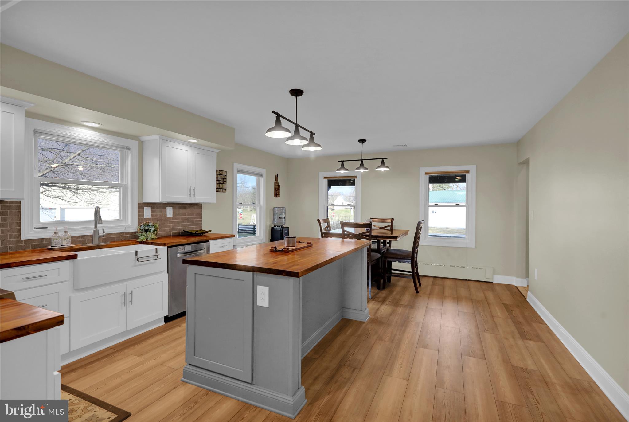 303 Gates Road Hershey, PA 17033 - Photo 35 of 53 a kitchen with lots of counter top space and dining table