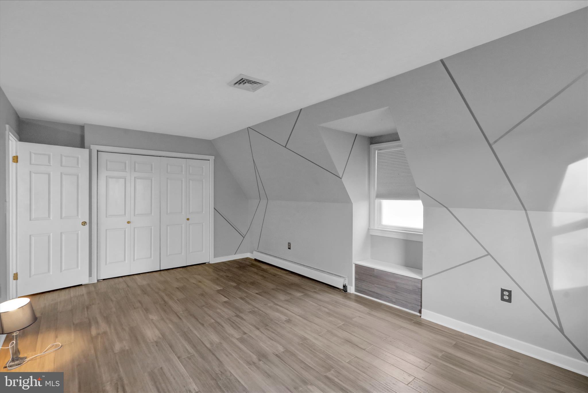 303 Gates Road Hershey, PA 17033 - Photo 41 of 53 a view of an empty room with wooden floor