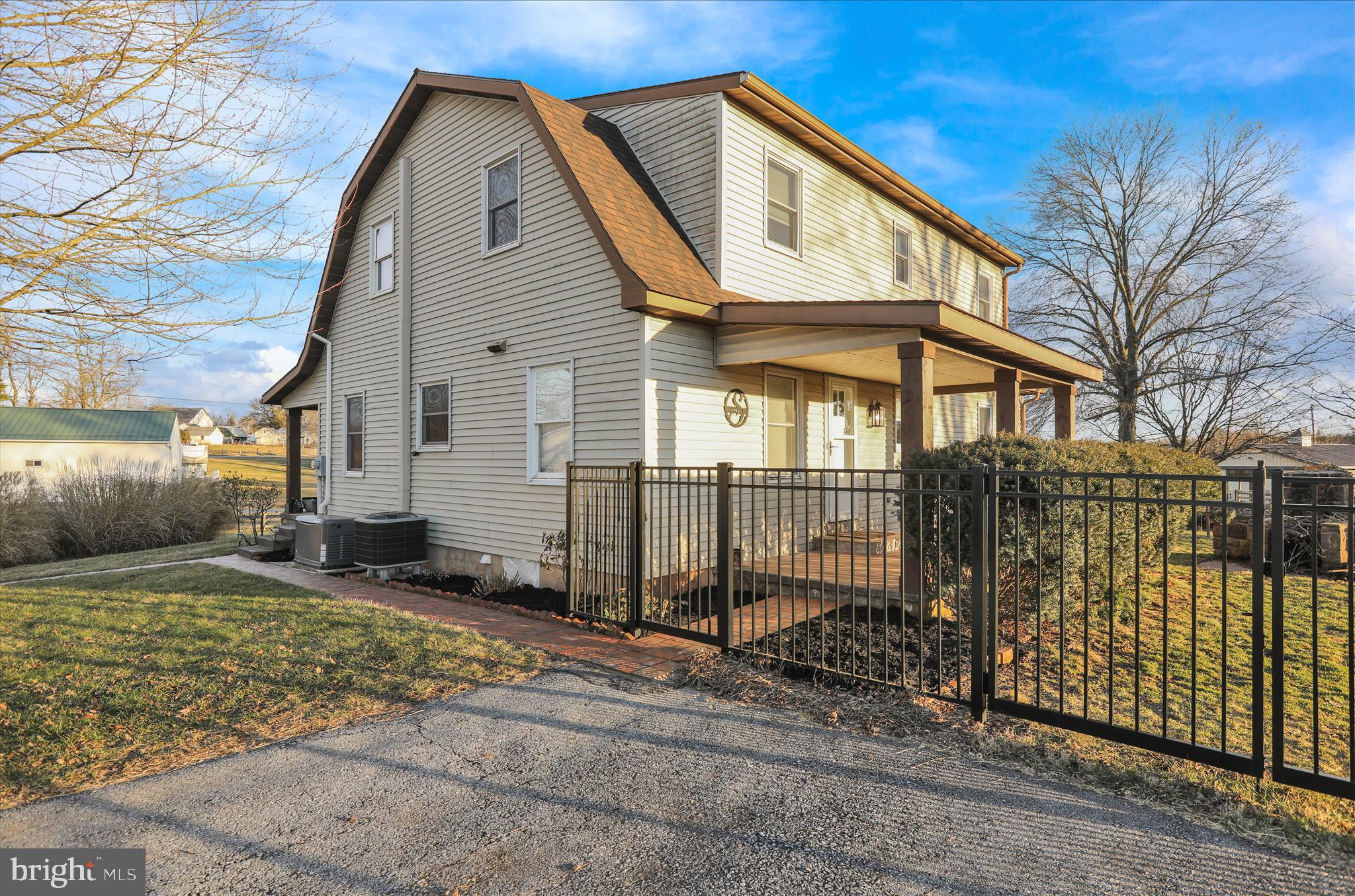 303 Gates Road Hershey, PA 17033 - Photo 49 of 53 a front view of a house with a yard