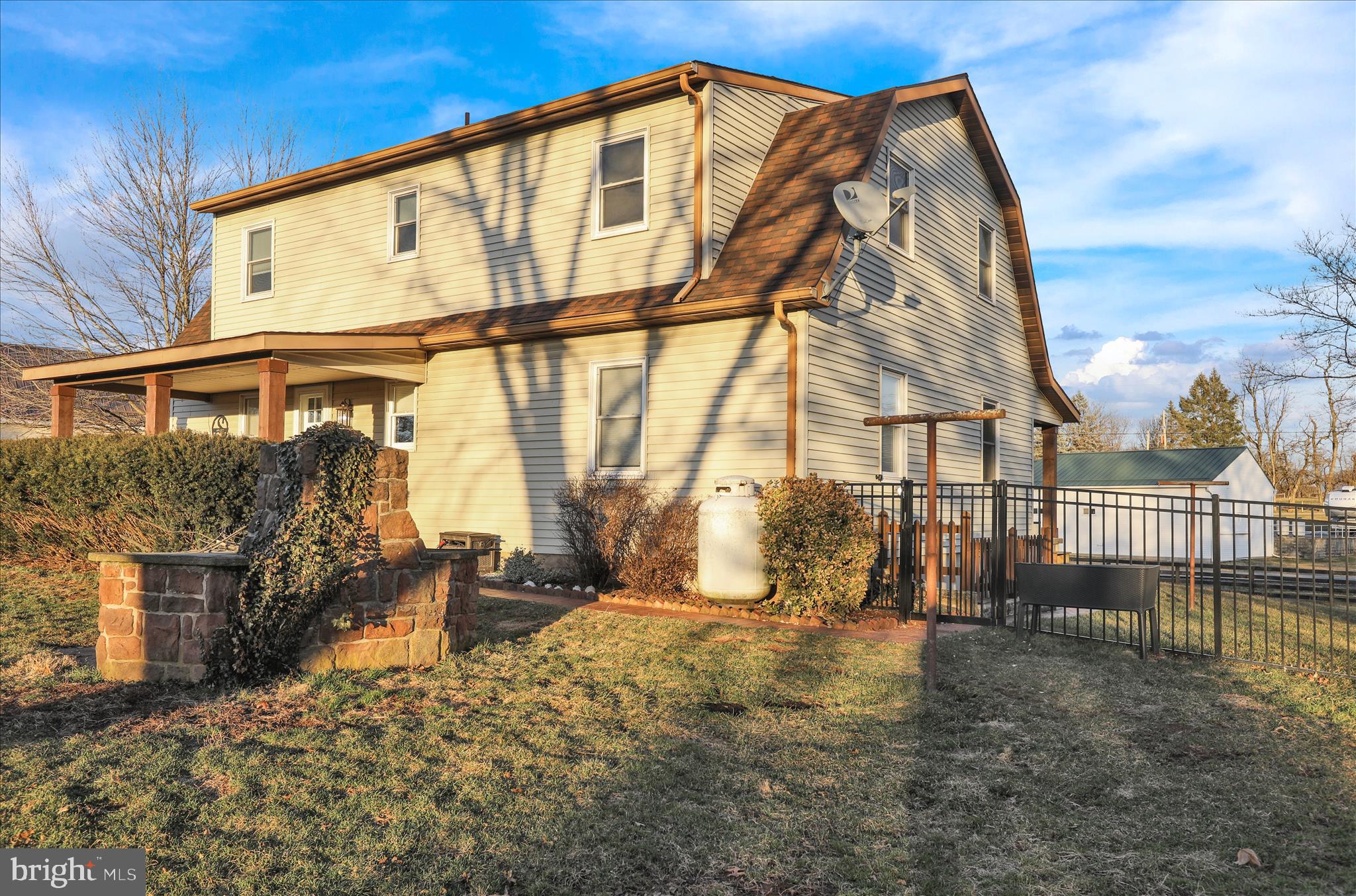303 Gates Road Hershey, PA 17033 - Photo 53 of 53 a view of a house with a yard