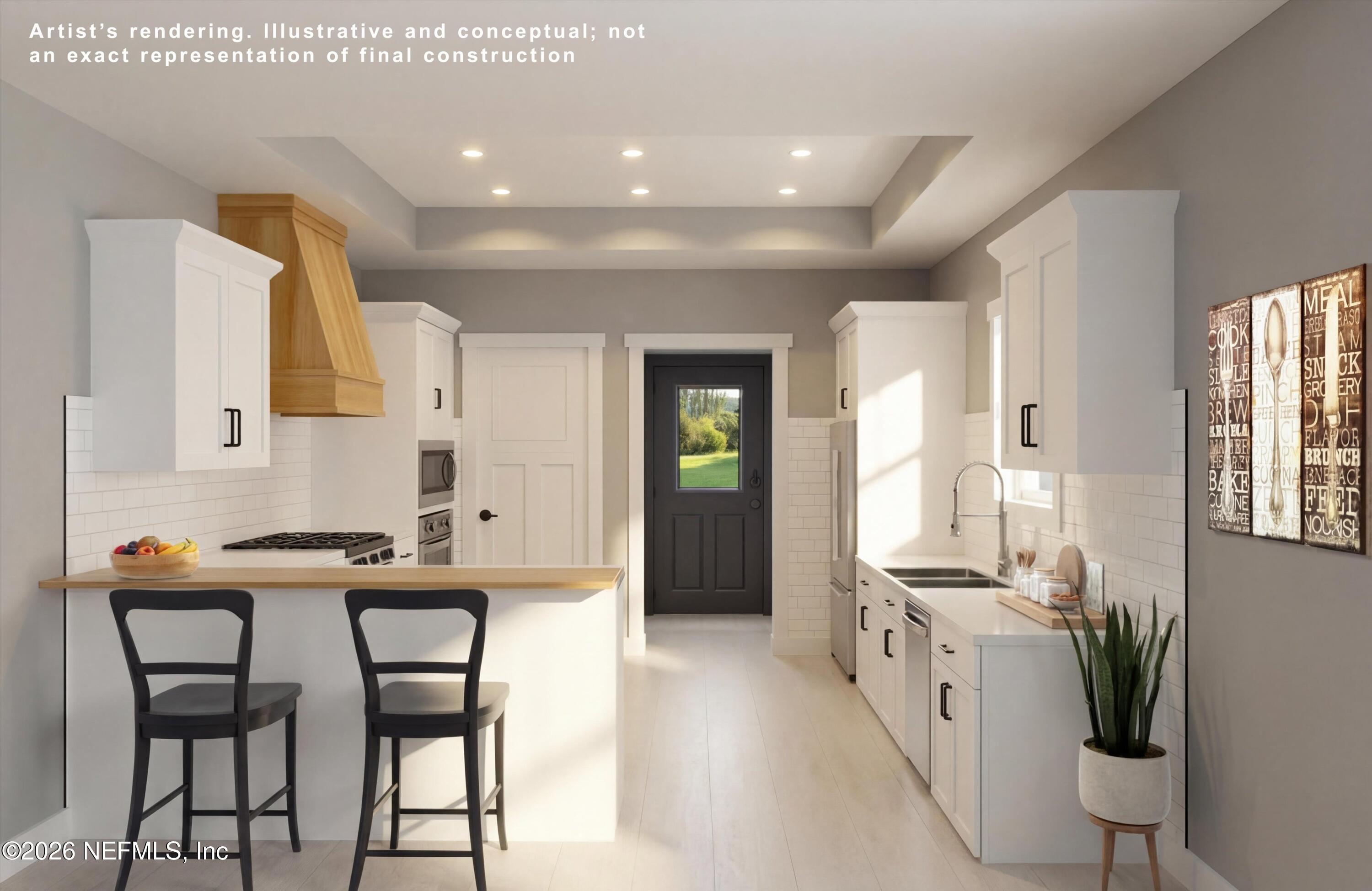 0 Nelsons Point, Unit PARCEL 000 Keystone Heights, FL 32656 - Photo 3 of 29 a kitchen with stainless steel appliances a table and chairs in it