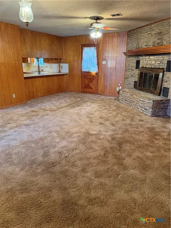 a view of a livingroom with a fireplace
