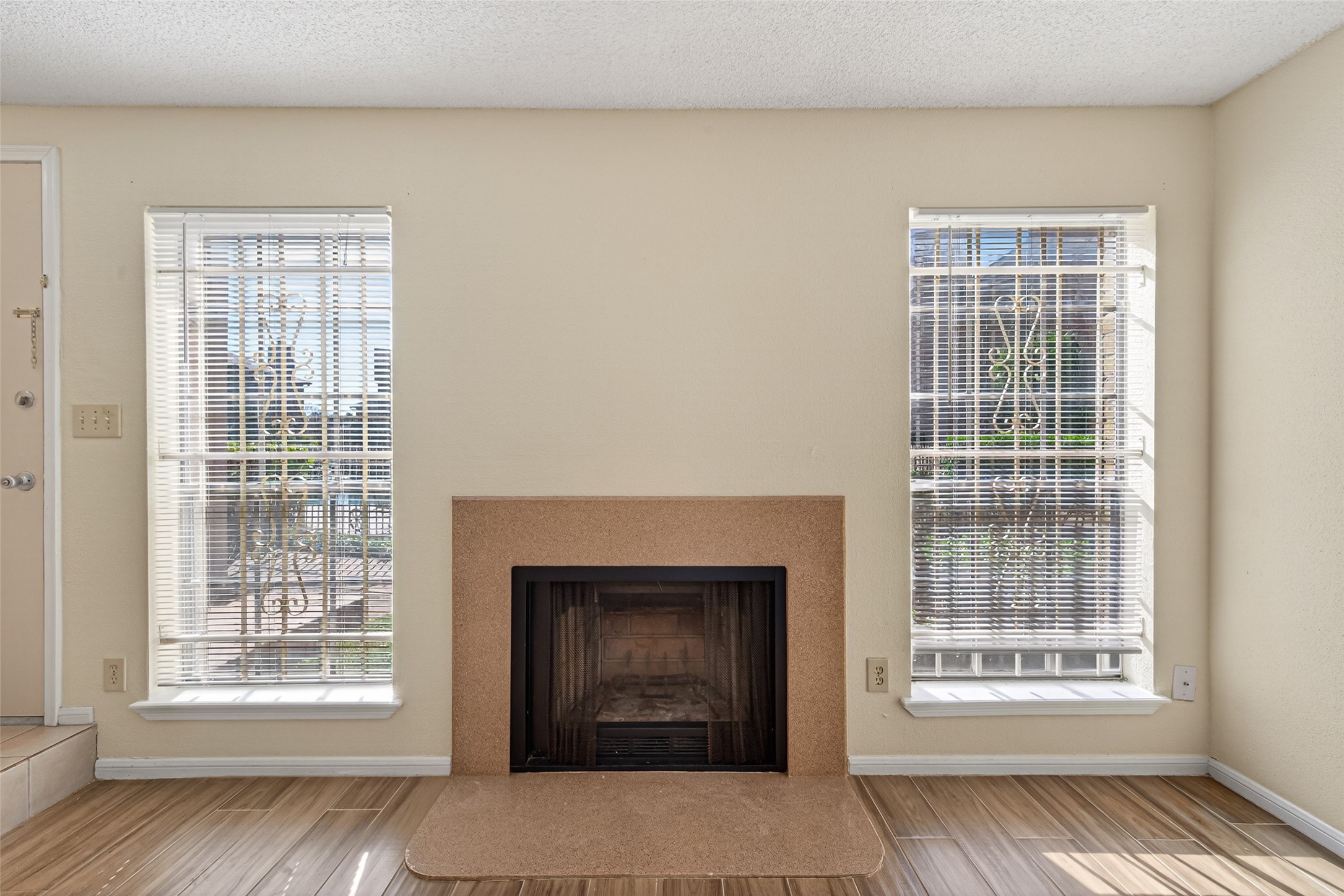 3100 Jeanetta Street, Unit 1004 Houston, TX 77063 - Photo 12 of 46 a living room with furniture and a fireplace