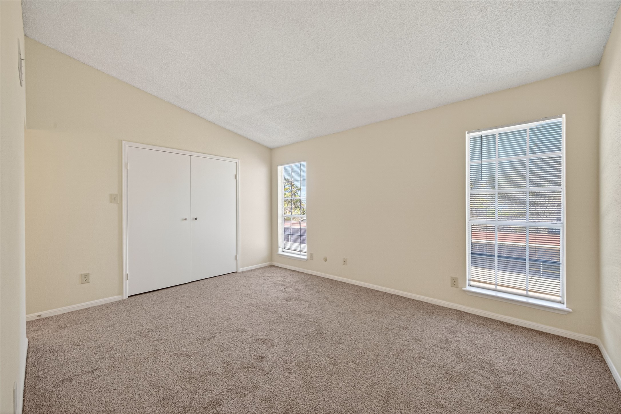 3100 Jeanetta Street, Unit 1004 Houston, TX 77063 - Photo 27 of 46 an empty room with windows