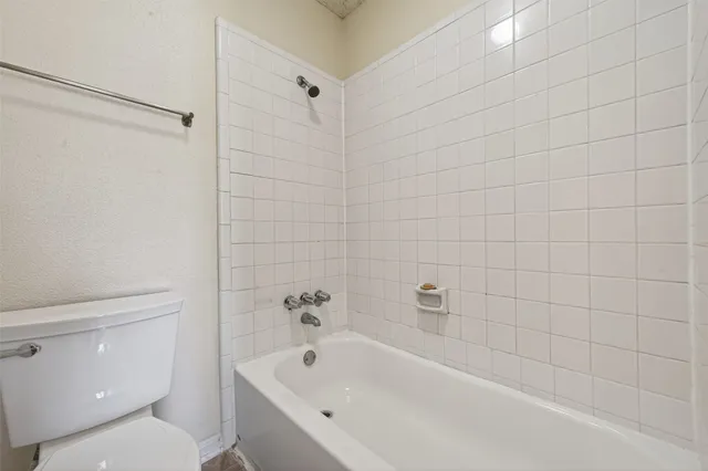 a view of a back yard from a porch