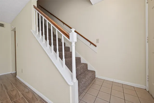 a view of kitchen with wooden floor