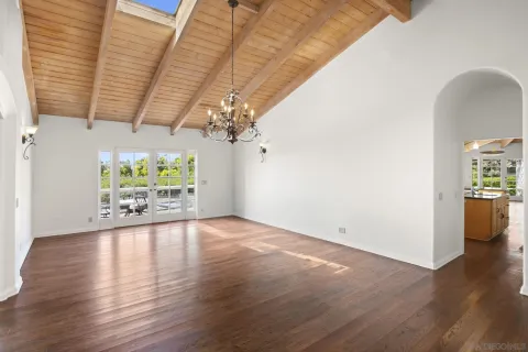 a view of kitchen with furniture and flat screen tv