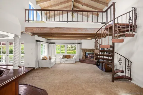 a view of room with window and wooden floor