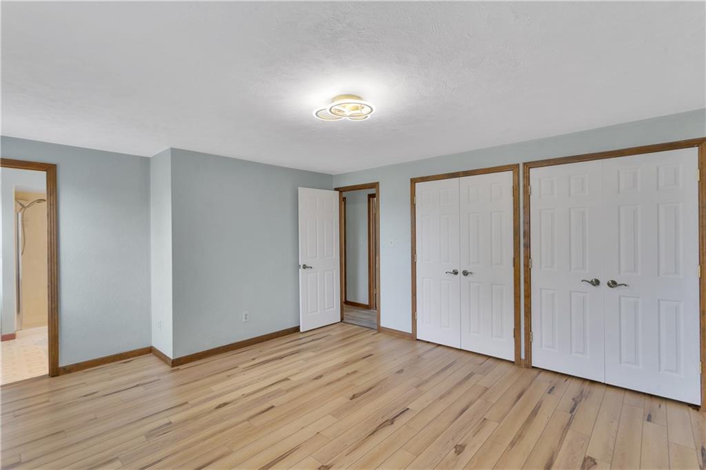 1792 McClure Road Monroeville, PA 15146 - Photo 17 of 41 Spacious primary bedroom with two closets and a new light fixture.