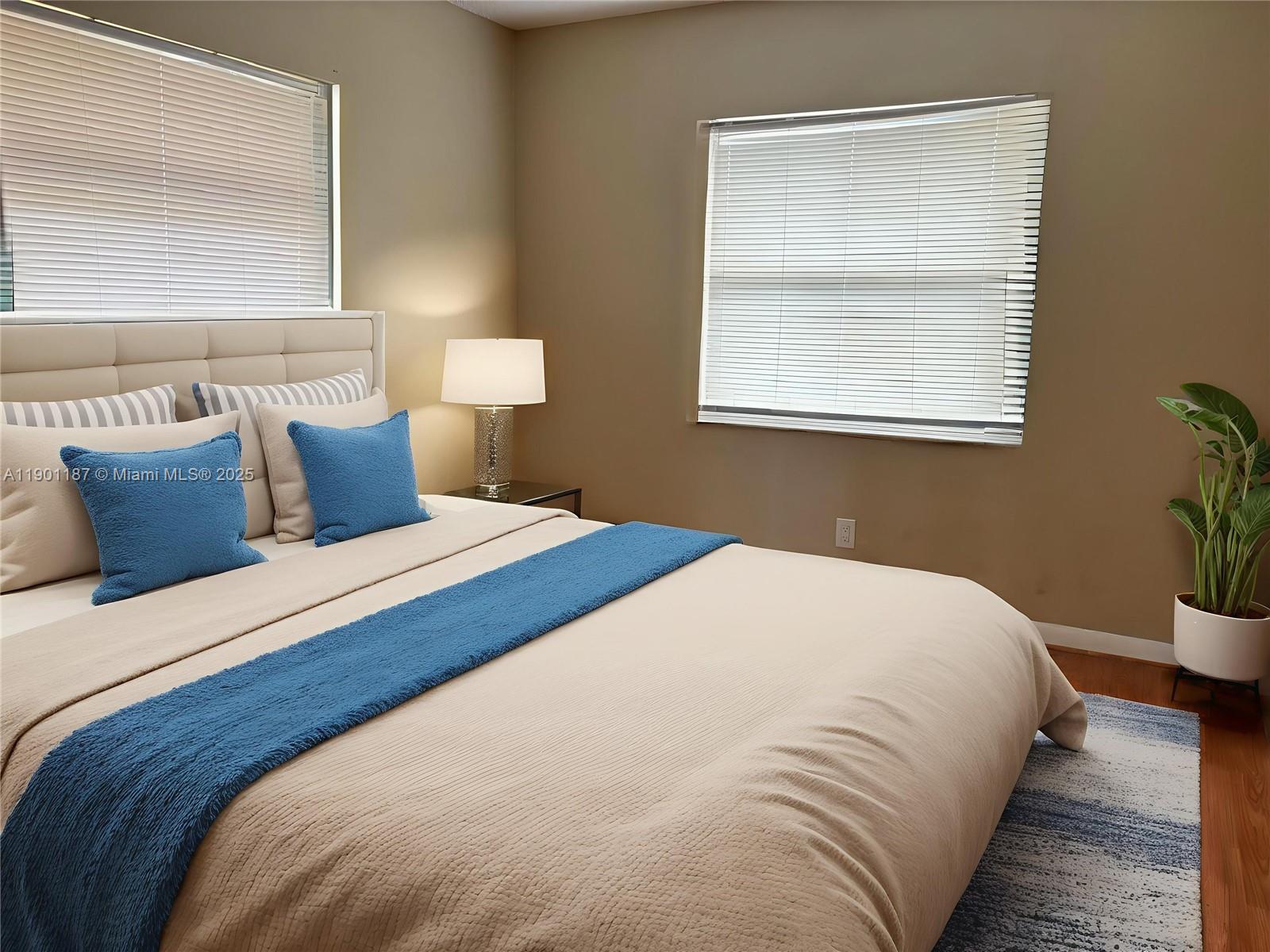 6541 Southwest 41st Court, Unit 173 Davie, FL 33314 - Photo 12 of 24 a bedroom with a bed and window