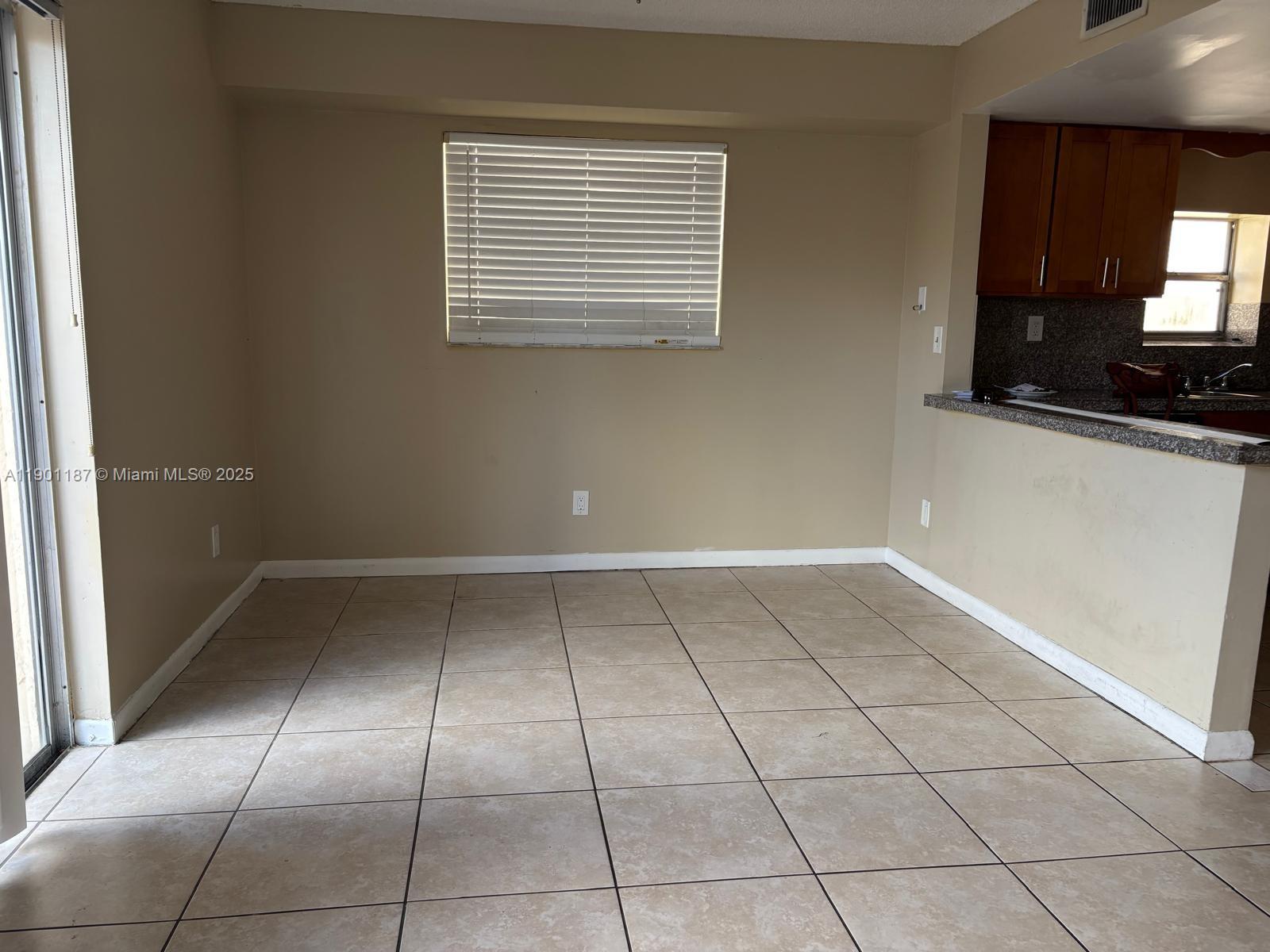 6541 Southwest 41st Court, Unit 173 Davie, FL 33314 - Photo 20 of 24 a view of a kitchen with a sink and a window