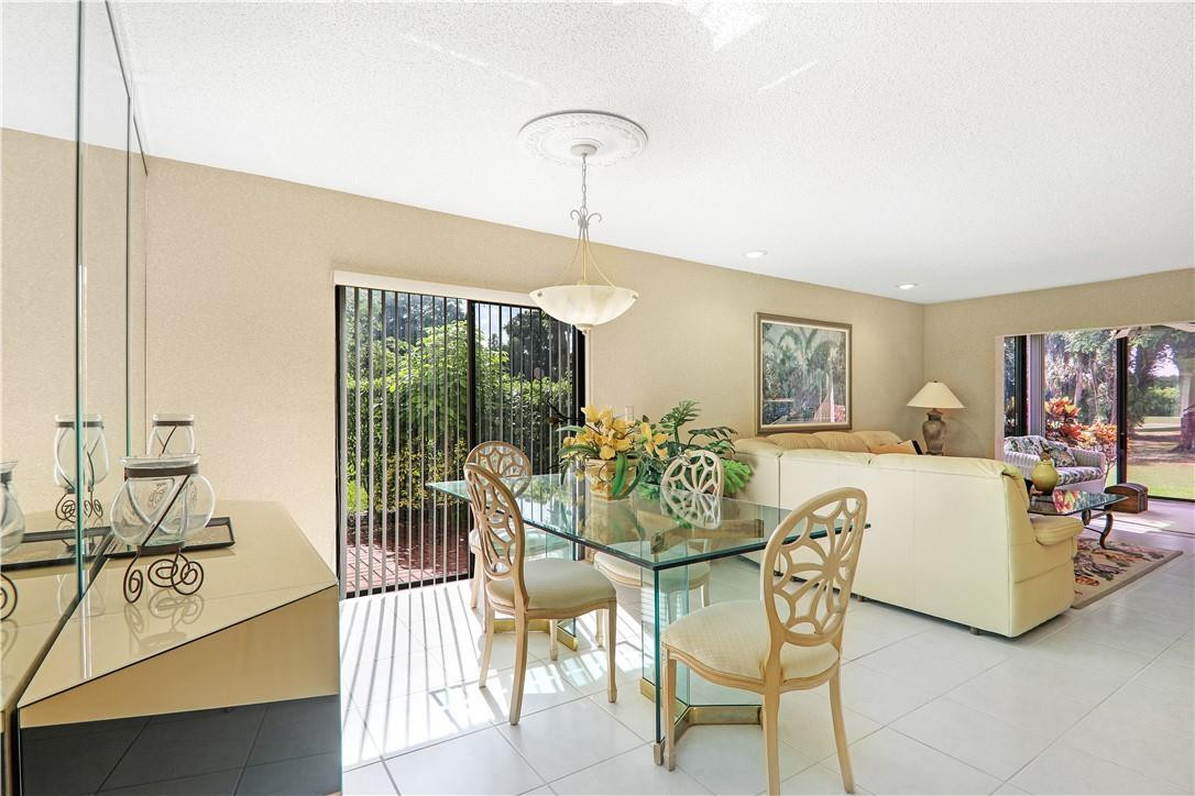 7956 Eastlake Drive, Unit A Boca Raton, FL 33433 - Photo 7 of 24 Dining area with bonus side patio