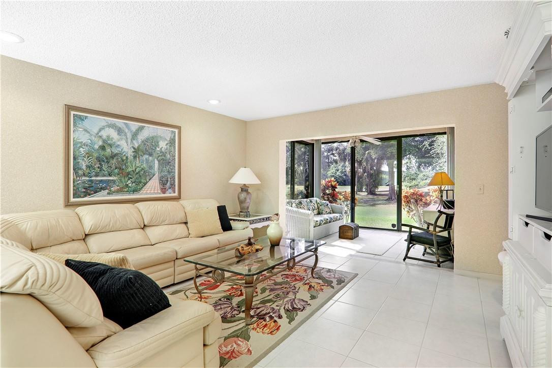 7956 Eastlake Drive, Unit A Boca Raton, FL 33433 - Photo 10 of 24 Living Room to enclosed patio