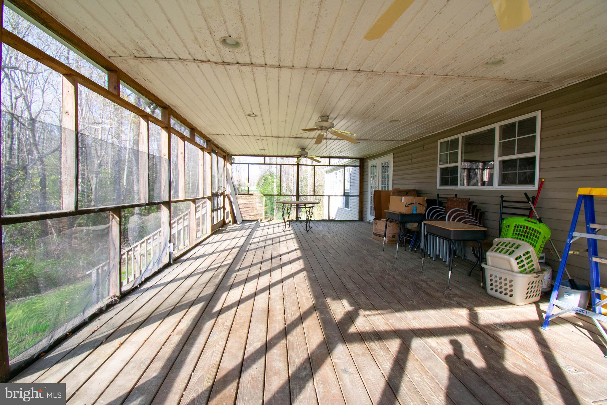 8791 Menokin Road Montross, VA 22520 - Photo 33 of 37 a view of a dining room with furniture window and outside view