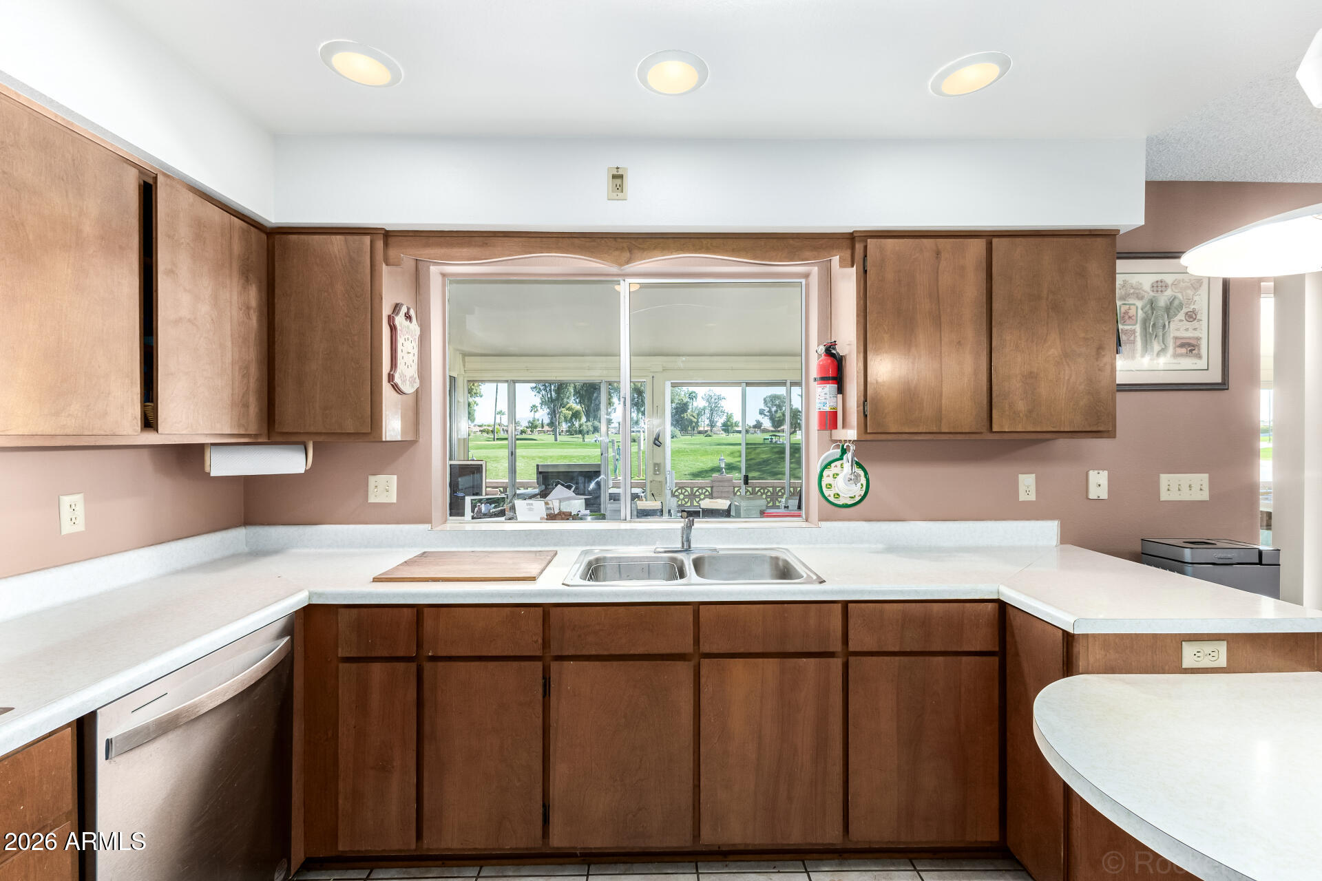 955 South Rochester Mesa, AZ 85206 - Photo 12 of 32 a kitchen with a sink cabinets and window