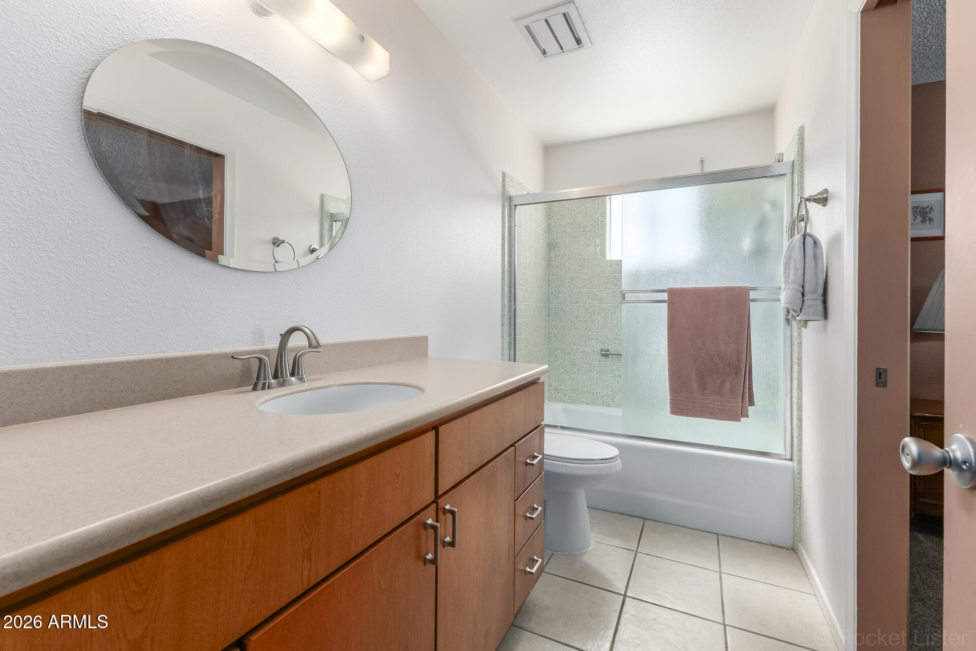 955 South Rochester Mesa, AZ 85206 - Photo 16 of 32 a bathroom with a double vanity sink mirror and toilet