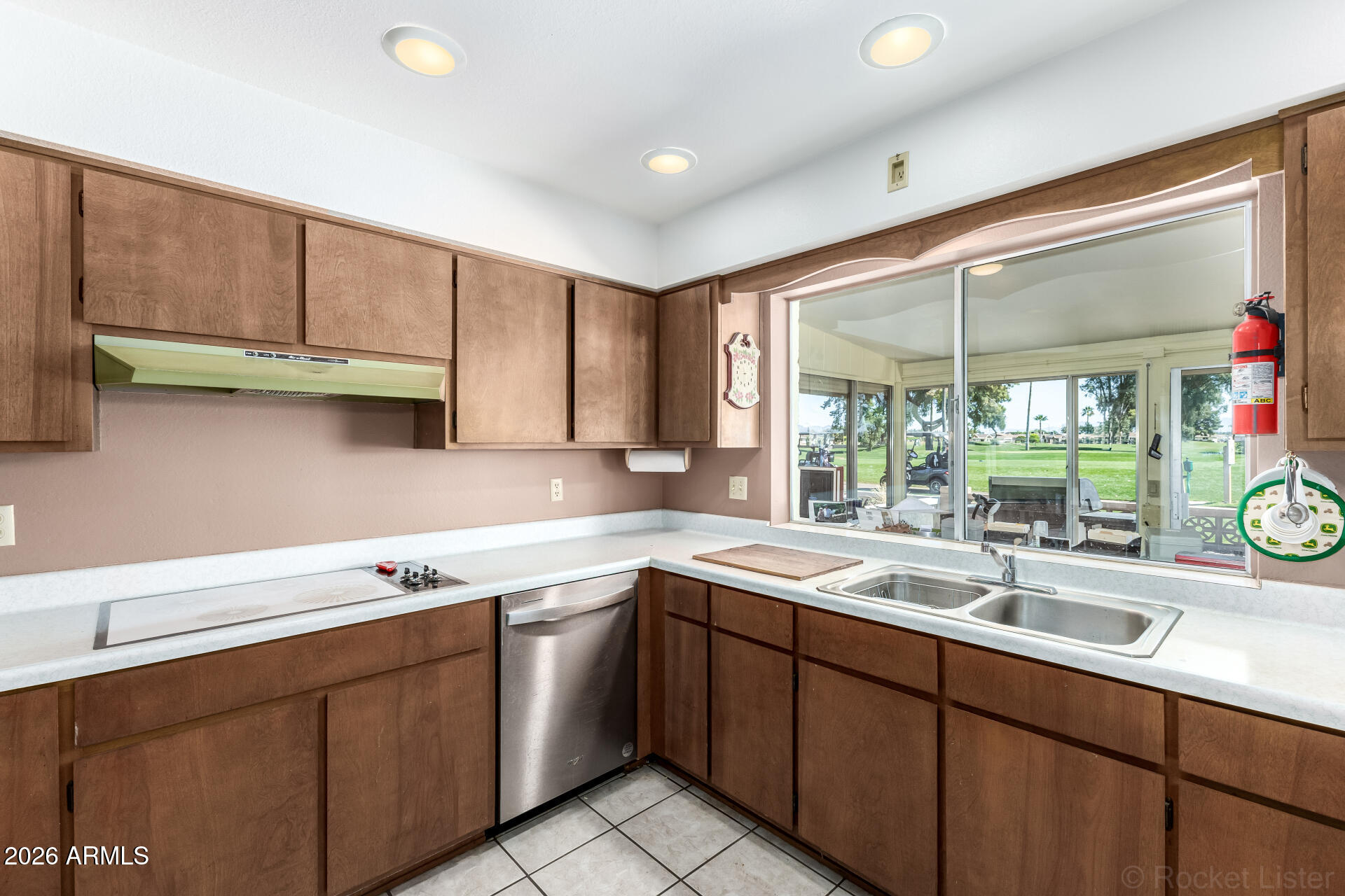 955 South Rochester Mesa, AZ 85206 - Photo 17 of 32 a kitchen with a sink cabinets and window