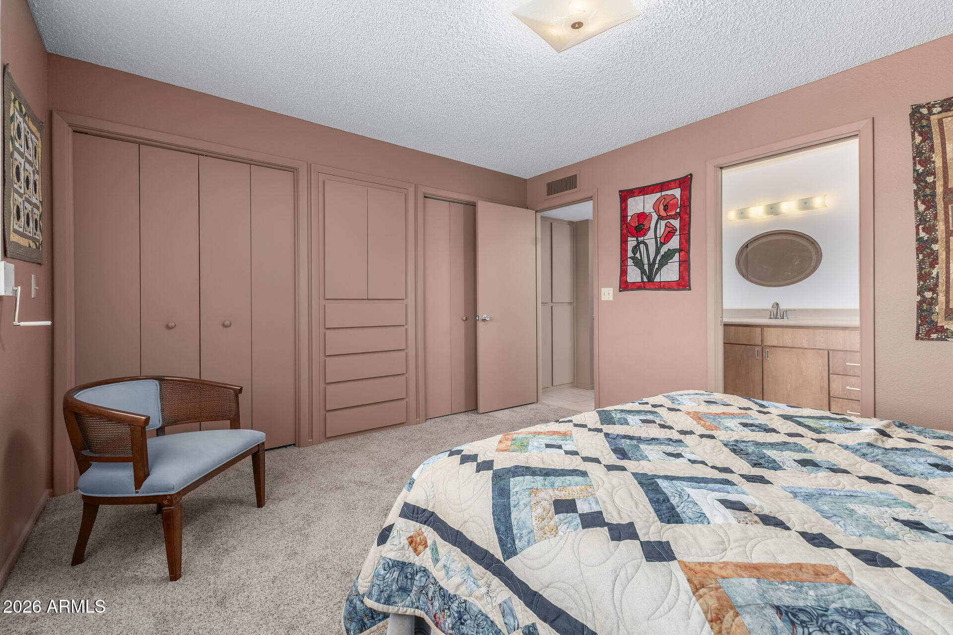 955 South Rochester Mesa, AZ 85206 - Photo 24 of 32 a bedroom with a bed and a table in it