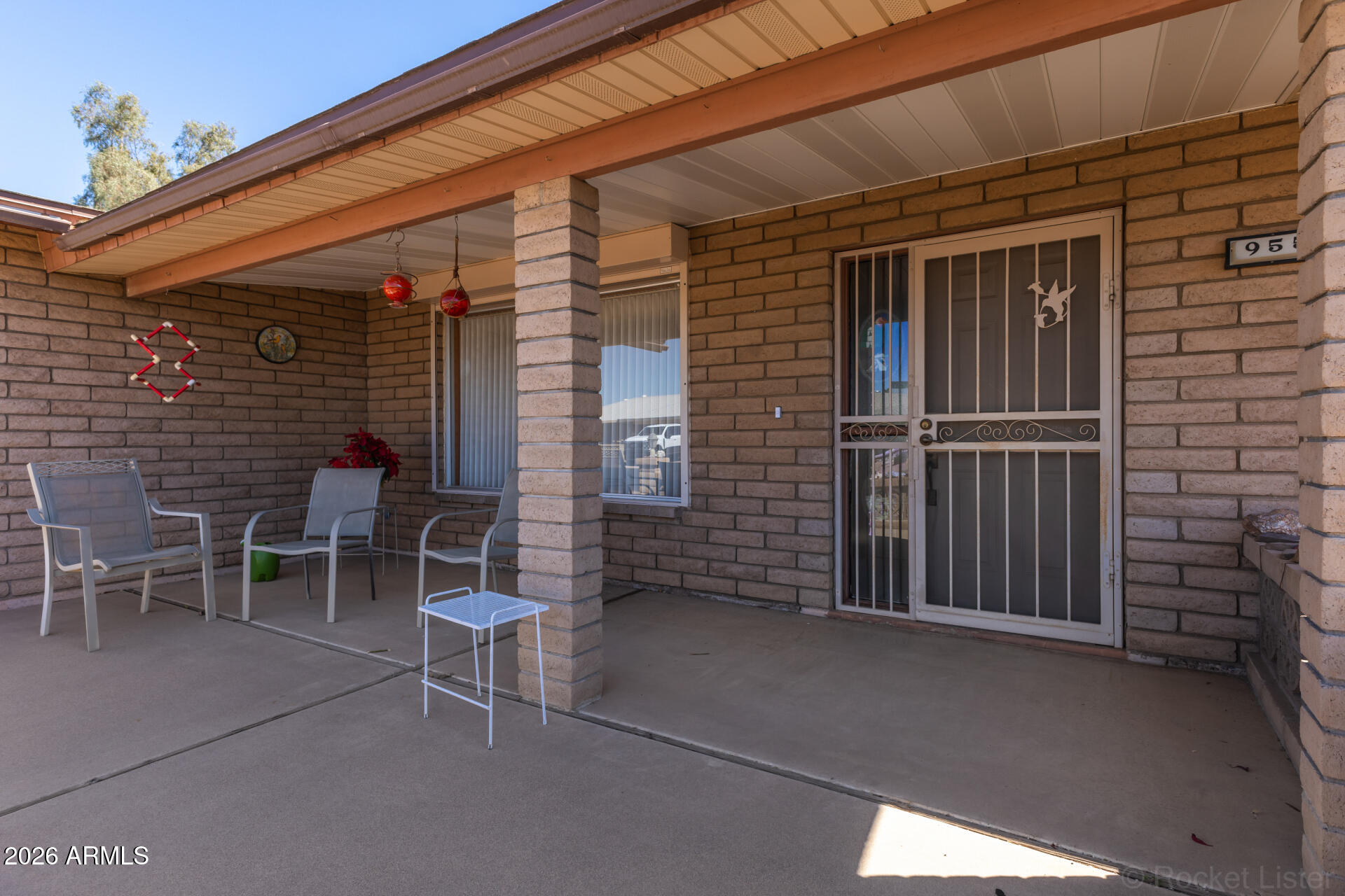 955 South Rochester Mesa, AZ 85206 - Photo 25 of 32 a backyard of a house with outdoor seating