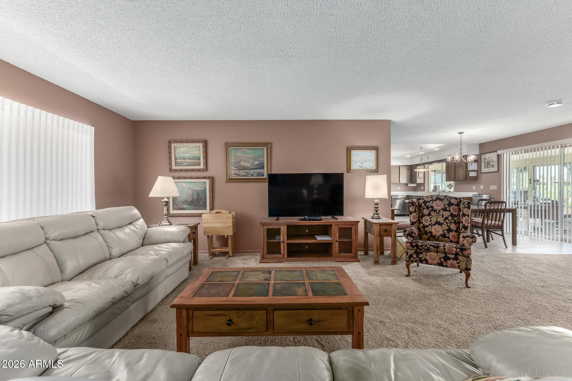 955 South Rochester Mesa, AZ 85206 - Photo 8 of 32 a living room with furniture and a flat screen tv