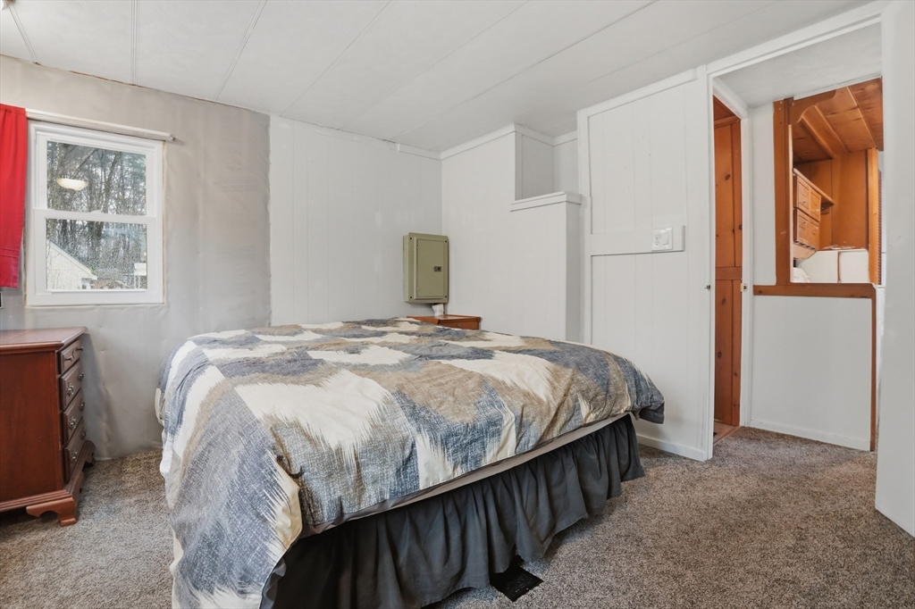 17 Conestoga Trail Brookfield, MA 01506 - Photo 11 of 20 a bedroom with a bed and wooden floor