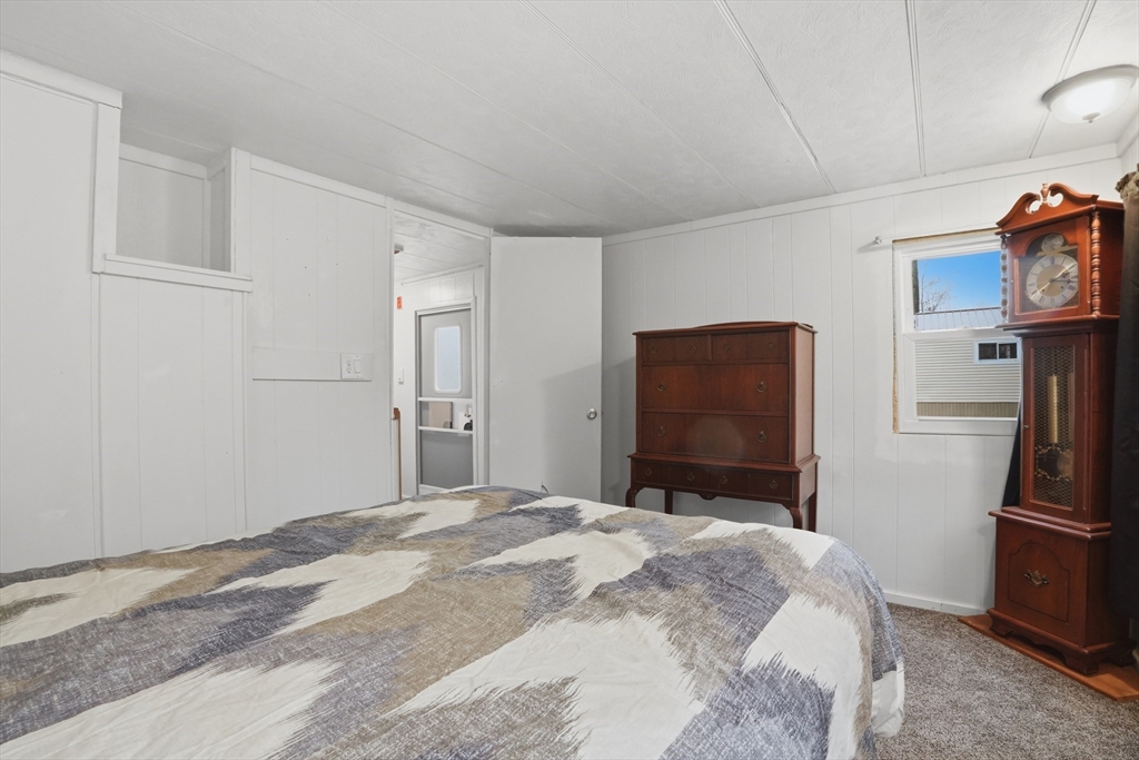 17 Conestoga Trail Brookfield, MA 01506 - Photo 12 of 20 a bedroom with a bed and a flat screen tv